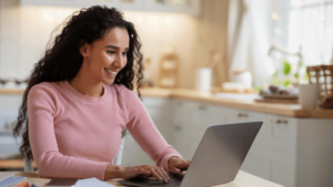 female employee using laptop to take online customer service training