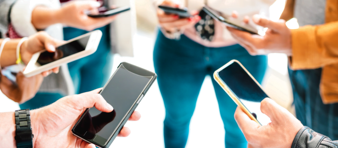 Group of customers using their smartphones