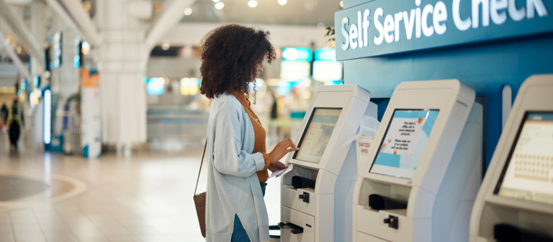 Woman using a service-service kiosk